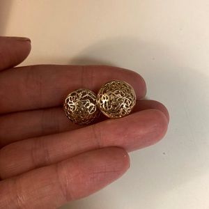 Gold stud earrings